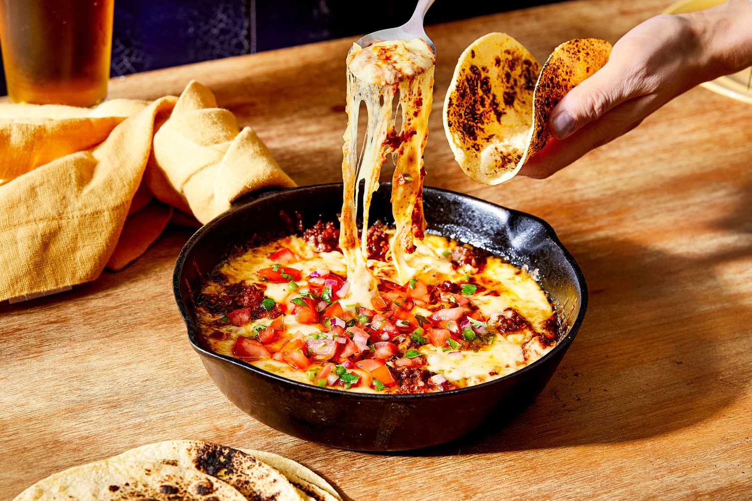 Queso fundido in cast iron skillet